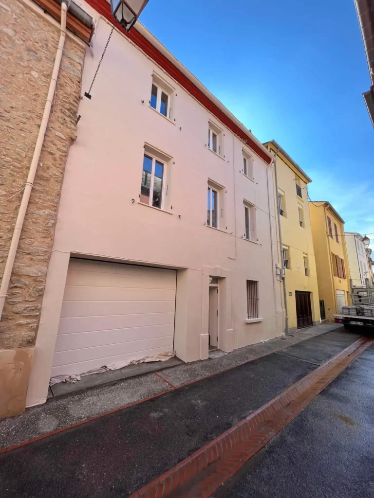 Ravalement de façade immeuble ancien rénové
